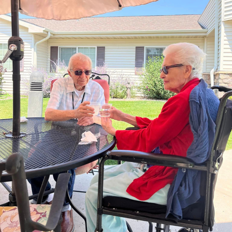 Cappella Pueblo West Senior Living Community in Pueblo West, CO - couple having a drink square